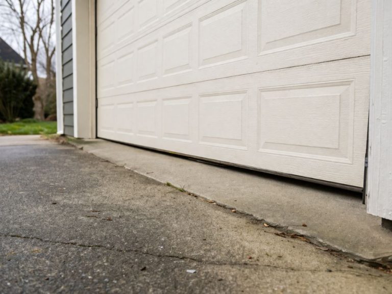 What Your Garage Door Is Trying to Tell You About Your Foundation
